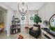 Bright sitting area with a large chandelier and comfortable seating at 11321 Chilly Water Ct, Riverview, FL 33569