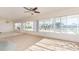 Large living room with sliding doors leading to the backyard at 11775 6Th E St, Treasure Island, FL 33706