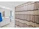 Simple bathroom with shower/tub combo and updated vanity at 1202 Sawdust Ct, Valrico, FL 33596