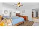 Serene bedroom offering ample closet space and wood flooring at 1202 Sawdust Ct, Valrico, FL 33596