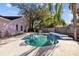 Relaxing kidney-shaped pool in sunny backyard at 1202 Sawdust Ct, Valrico, FL 33596