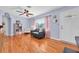 Living room featuring hardwood floors and gray couch at 1219 46Th N Ave, St Petersburg, FL 33703