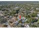 House aerial view showing property and surrounding area at 12305 N Rome Ave, Tampa, FL 33612