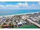 Beautiful aerial shot of a beach community with waterfront homes, a bridge, docks and a clear view of the ocean at 143 94Th Ave # 2, Treasure Island, FL 33706