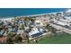 Breathtaking aerial view of coastal homes, sandy beaches, and the Gulf waters at 143 94Th Ave # 2, Treasure Island, FL 33706