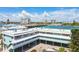 Coastal building featuring ground-level parking and covered walkways, offering easy access to units at 143 94Th Ave # 2, Treasure Island, FL 33706