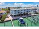 Waterfront condo complex with covered parking and a shared boat dock for easy access to the water at 143 94Th Ave # 2, Treasure Island, FL 33706