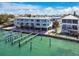 Inviting waterfront condo complex with covered parking and a shared boat dock for easy access to the water at 143 94Th Ave # 2, Treasure Island, FL 33706