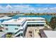 Charming waterfront condo complex with covered parking and a shared boat dock for residents at 143 94Th Ave # 2, Treasure Island, FL 33706