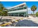 Charming coastal building elevated on stilts providing covered parking and great outdoor living space in a waterfront community at 143 94Th Ave # 2, Treasure Island, FL 33706