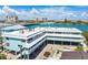 Scenic waterfront condo complex with covered parking, stunning water views, and a shared boat dock at 143 94Th Ave # 2, Treasure Island, FL 33706
