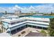 Scenic waterfront condo complex with covered parking, stunning water views, and a shared boat dock at 143 94Th Ave # 2, Treasure Island, FL 33706