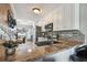 A view of the kitchen featuring granite countertops and stainless appliances. Stylish backsplash and decor at 143 94Th Ave # 2, Treasure Island, FL 33706