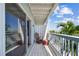 Relaxing balcony overlooking the water with seating at 143 94Th Ave # 2, Treasure Island, FL 33706