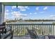 Waterfront balcony with seating and stunning water views at 143 94Th Ave # 2, Treasure Island, FL 33706