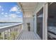Peaceful balcony with water view and access to bedroom at 143 94Th Ave # 2, Treasure Island, FL 33706
