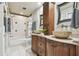 Modern bathroom with double vanity and vessel sinks at 143 94Th Ave # 2, Treasure Island, FL 33706