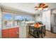 Bright kitchen with breakfast nook and water view at 143 94Th Ave # 2, Treasure Island, FL 33706