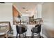 Kitchen with granite countertops and breakfast bar at 143 94Th Ave # 2, Treasure Island, FL 33706