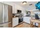 Updated kitchen with stainless steel appliances and white cabinets at 143 94Th Ave # 2, Treasure Island, FL 33706