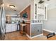 Kitchen boasts unique tin tile and a rustic wooden cart at 143 94Th Ave # 2, Treasure Island, FL 33706
