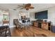 Spacious living area featuring hardwood floors and a view into the kitchen at 143 94Th Ave # 2, Treasure Island, FL 33706