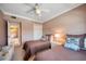 Two twin beds in a well-lit bedroom with ensuite bathroom access at 17400 Gulf Blvd # I5, Redington Shores, FL 33708