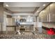 Modern kitchen with stainless steel appliances and granite countertops at 17400 Gulf Blvd # I5, Redington Shores, FL 33708