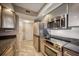 Modern stainless steel kitchen with granite countertops at 17400 Gulf Blvd # I5, Redington Shores, FL 33708
