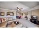 Open living room with sectional sofa and dining area at 17400 Gulf Blvd # I5, Redington Shores, FL 33708