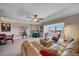 Comfortable living room with sectional sofa and water views at 17400 Gulf Blvd # I5, Redington Shores, FL 33708