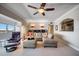 Spacious living room featuring a sectional sofa and city views at 17400 Gulf Blvd # I5, Redington Shores, FL 33708