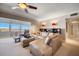 Relaxing living room with sectional sofa and city views at 17400 Gulf Blvd # I5, Redington Shores, FL 33708