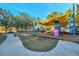 Playground with shaded areas and play equipment at 21246 Southern Charm Dr, Land O Lakes, FL 34637