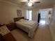 Well-lit bedroom with a double bed and built-in closet at 2361 Jamaican St # 15, Clearwater, FL 33763