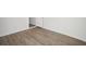 Room with wood-look floors and an open doorway at 2537 Martha Ln, Land O Lakes, FL 34639