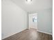 Cozy bedroom with light walls and vinyl flooring at 2537 Martha Ln, Land O Lakes, FL 34639