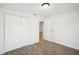 Charming bedroom with sliding door closet and access to another room at 2537 Martha Ln, Land O Lakes, FL 34639