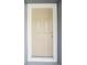 Beige front door with white trim at 2537 Martha Ln, Land O Lakes, FL 34639