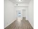 Clean hallway with access to multiple rooms at 2537 Martha Ln, Land O Lakes, FL 34639