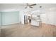 Open concept kitchen with stainless steel appliances and island at 2537 Martha Ln, Land O Lakes, FL 34639