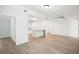 Bright living room features luxury vinyl plank flooring at 2537 Martha Ln, Land O Lakes, FL 34639