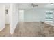 Living Room with light walls and wood-look floors at 2537 Martha Ln, Land O Lakes, FL 34639
