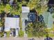 Overhead view of two houses with metal roofs at 2609 Meadowbrook Dr, Palm Harbor, FL 34684