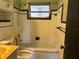 Retro bathroom with shower/tub combo and tile at 2620 S 19Th St, St Petersburg, FL 33712