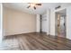 Spacious bedroom with wood-look floors and built-in shelving at 3206 W Azeele St # 100, Tampa, FL 33609