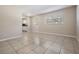 Bright and airy living room featuring tile floors and ample natural light at 3206 W Azeele St # 100, Tampa, FL 33609