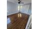 Large bedroom with dark hardwood floors and ceiling fan at 3631 4Th N Ave, St Petersburg, FL 33713