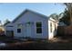 Newly renovated light purple house with a front yard at 3631 4Th N Ave, St Petersburg, FL 33713