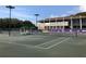 Well-maintained tennis courts with ample space for players at 36750 Us Highway 19 N # 11-112, Palm Harbor, FL 34684